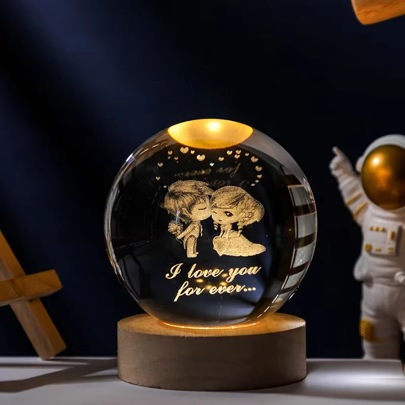 Crystal Ball Engraved Lamp with solar system laser-engraving, USB-powered warm light, and elegant wooden base. Perfect for bedroom decor, unique gifts, or creating a cosmic ambiance in any space.