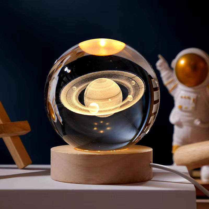 Crystal Ball Engraved Lamp with solar system laser-engraving, USB-powered warm light, and elegant wooden base. Perfect for bedroom decor, unique gifts, or creating a cosmic ambiance in any space.