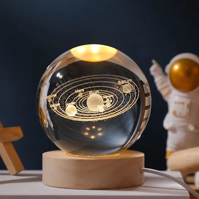 Crystal Ball Engraved Lamp with solar system laser-engraving, USB-powered warm light, and elegant wooden base. Perfect for bedroom decor, unique gifts, or creating a cosmic ambiance in any space.